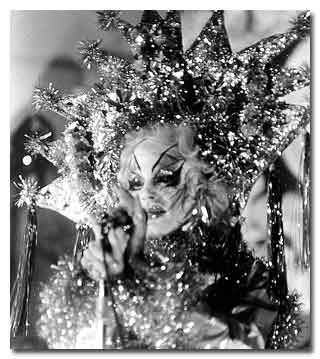 The Cockettes: Goldie Glitters in Pearls Over Shanghai. Photo copyright Susie Nightowl.