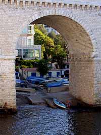 Boatyard beneath a corniche viaduct