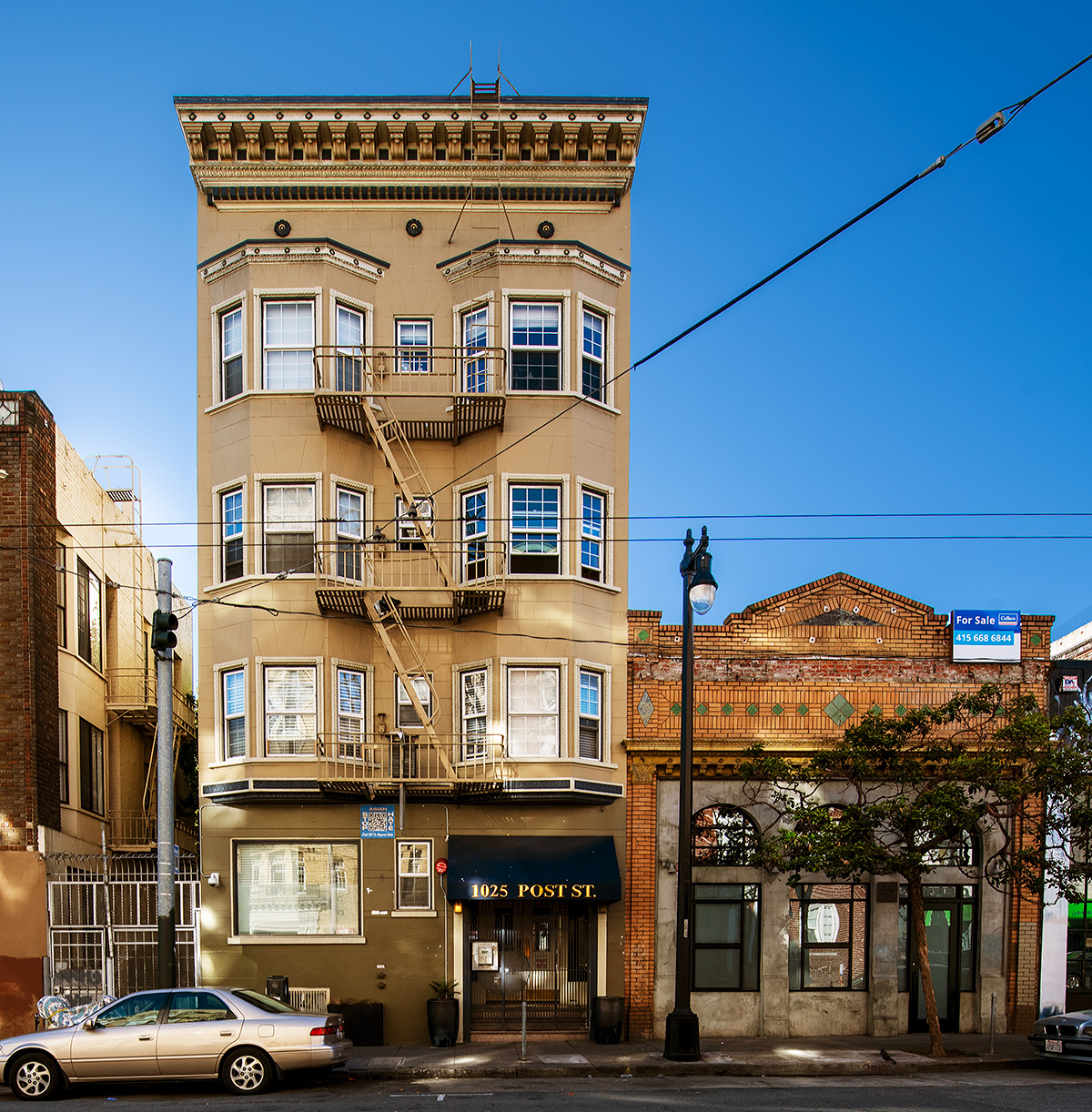 Four buildings at 1035-1055 Street built between 1914 and 1921