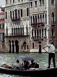 Putting the Top Up on a Gondola, Venice, Italy.